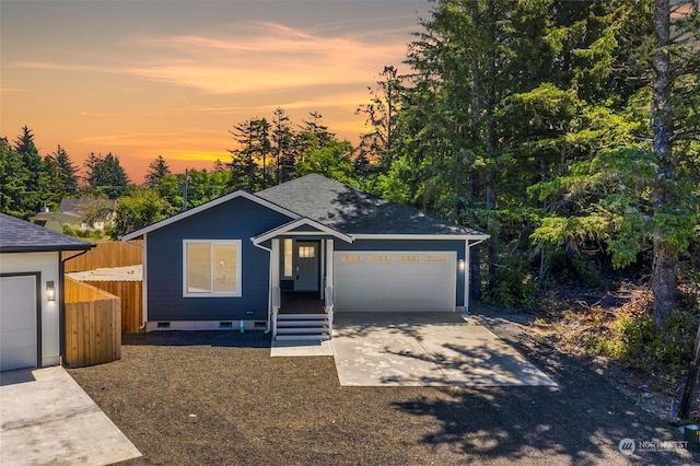 view of front of property featuring a garage