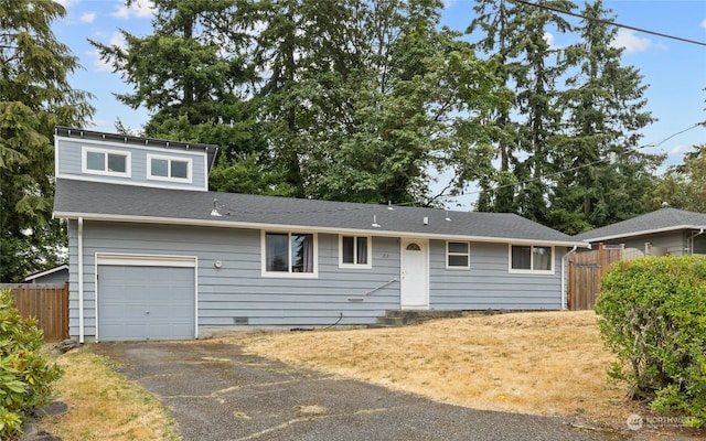 view of front of house with a garage