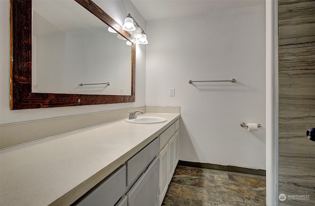 bathroom with vanity and tile patterned floors