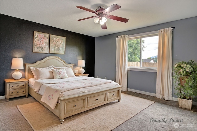 carpeted bedroom featuring ceiling fan