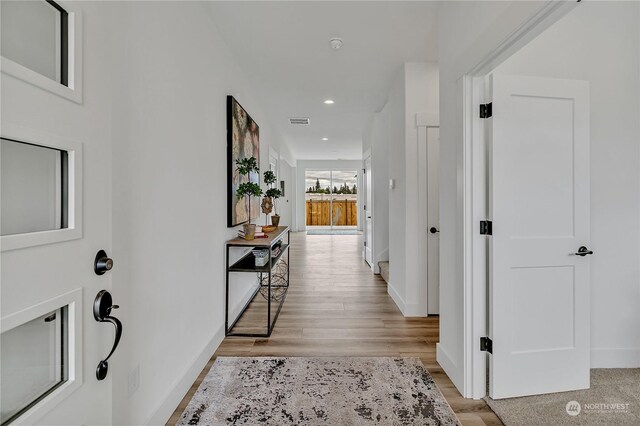 hallway featuring light hardwood / wood-style floors