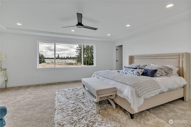 carpeted bedroom featuring ceiling fan, baseboards, and recessed lighting