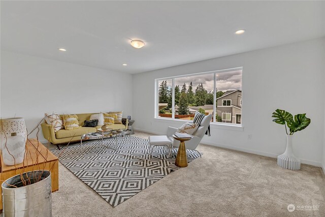 living room with light colored carpet