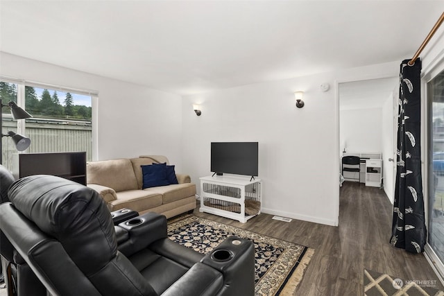 living room featuring dark hardwood / wood-style flooring