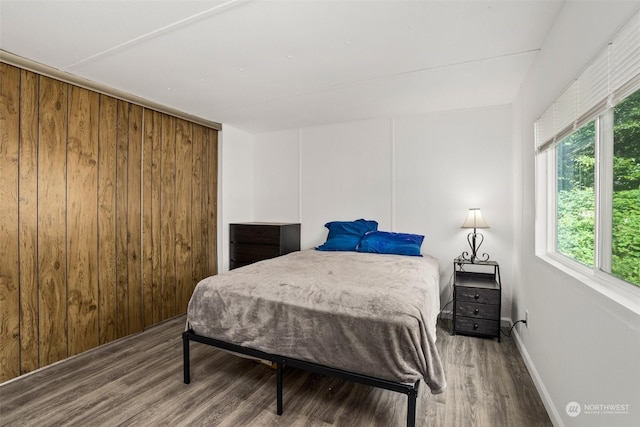 bedroom featuring wood-type flooring