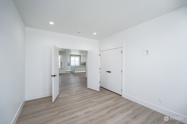 empty room featuring light hardwood / wood-style floors