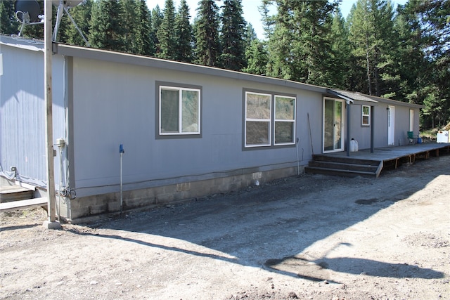 view of front of house featuring a wooden deck