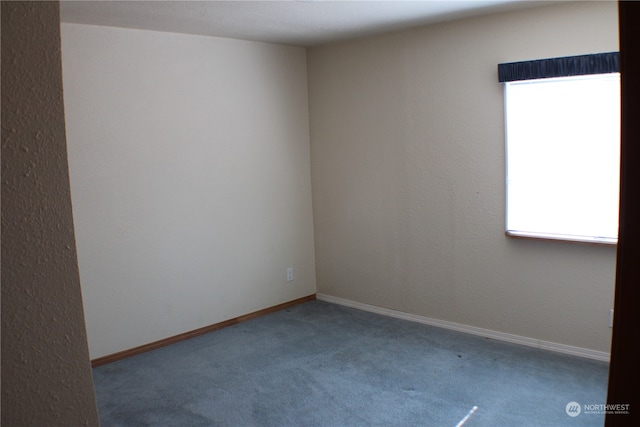 empty room with carpet floors