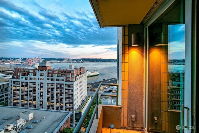 balcony at dusk with a water view