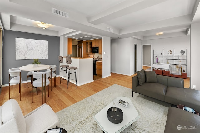 living room featuring hardwood / wood-style flooring