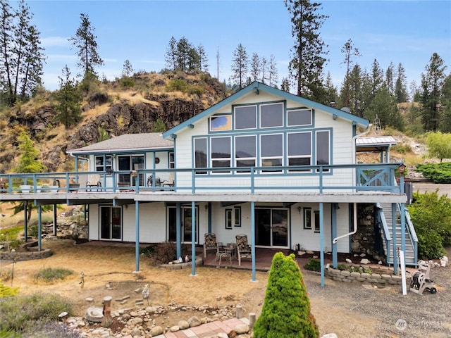 rear view of house with a deck