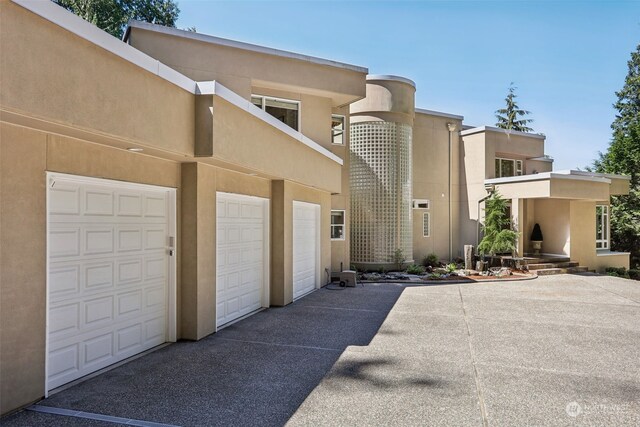 exterior space with a garage