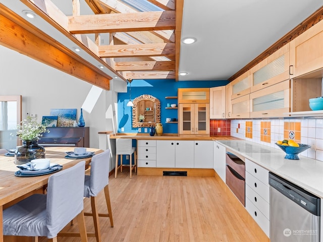 kitchen featuring beamed ceiling, light wood-type flooring, decorative backsplash, and dishwasher