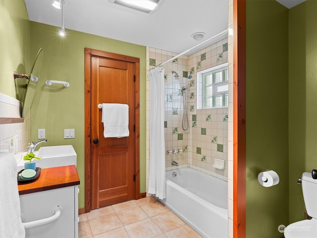 full bathroom with tile patterned floors, vanity, shower / bath combination with curtain, and toilet