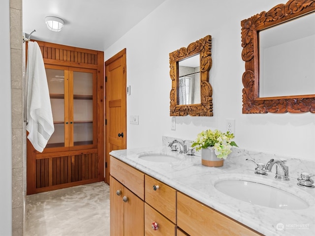 bathroom featuring double vanity