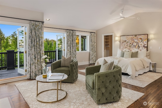 bedroom with wood-type flooring, a spacious closet, access to exterior, ceiling fan, and a closet