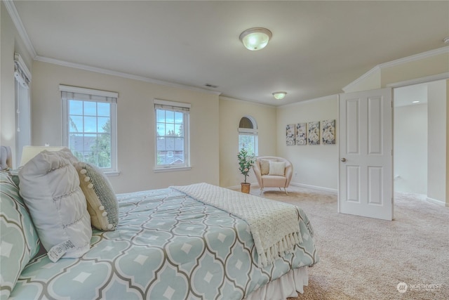 carpeted bedroom featuring ornamental molding