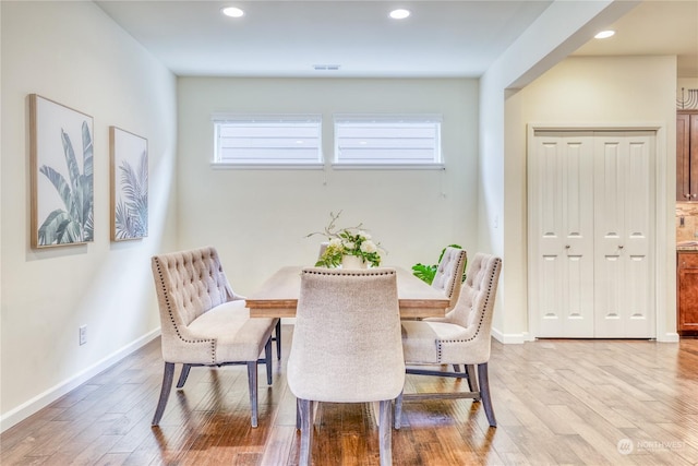 dining room featuring light wood-type flooring