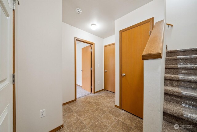 corridor featuring tile patterned flooring