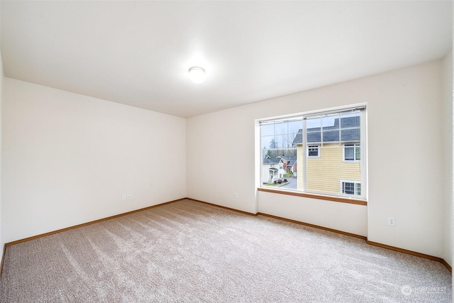 view of carpeted spare room