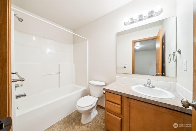 full bathroom with vanity, tub / shower combination, and toilet