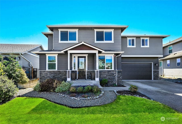 view of front facade featuring a front yard