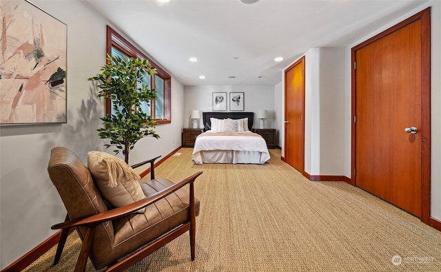 bedroom with light colored carpet