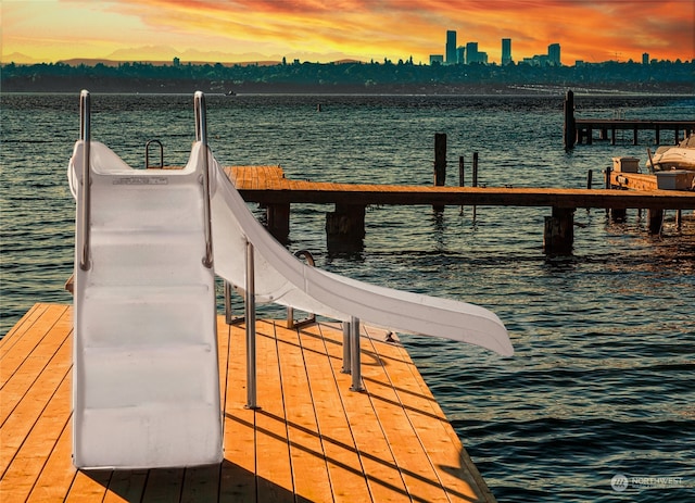 dock area featuring a water view