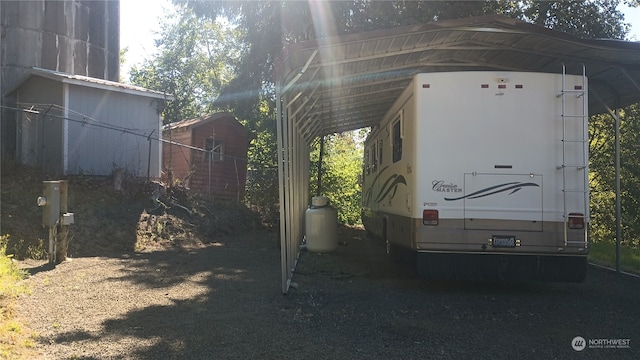 exterior space with a carport