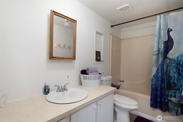 full bathroom featuring toilet, shower / bath combo, visible vents, and vanity