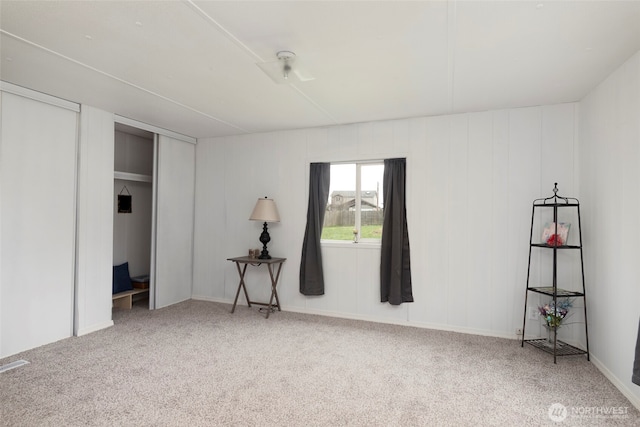 carpeted bedroom with visible vents