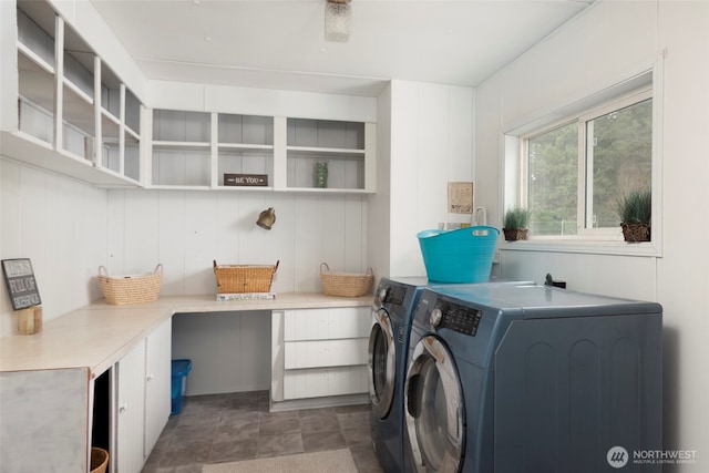 laundry area featuring washing machine and dryer and laundry area