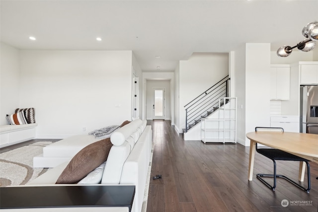 living room featuring dark wood-type flooring