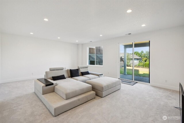 living room featuring light colored carpet