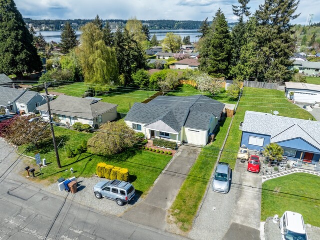 birds eye view of property featuring a water view