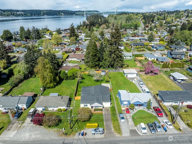 bird's eye view with a water view