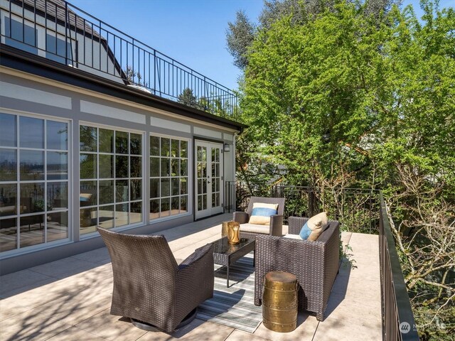 view of patio / terrace featuring a balcony and outdoor lounge area