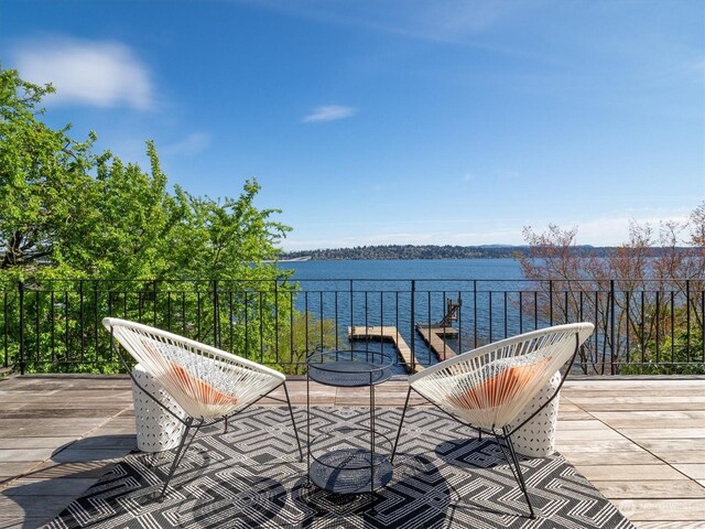 view of patio with a water view