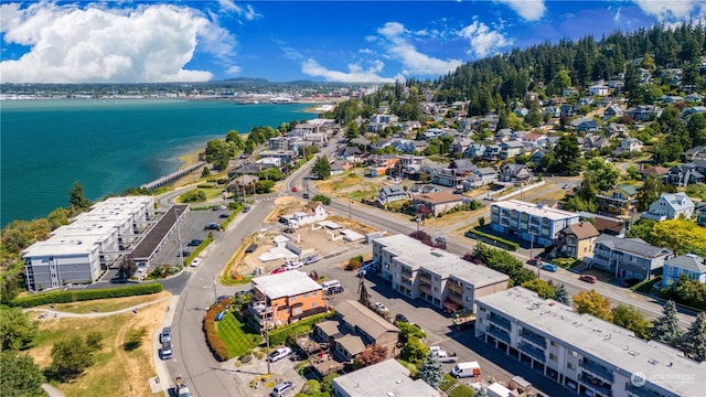 birds eye view of property featuring a water view