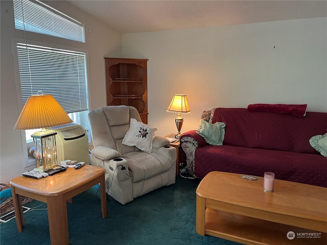 living room featuring dark carpet and plenty of natural light