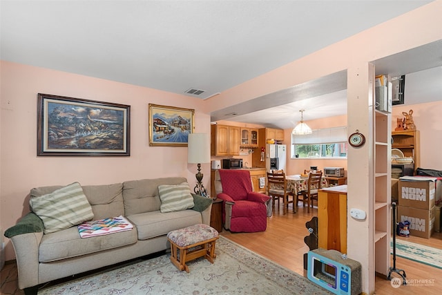 living room featuring light wood-type flooring