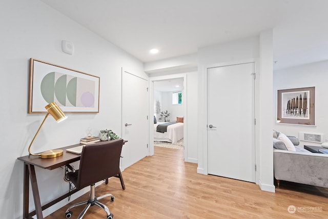 home office featuring light hardwood / wood-style flooring