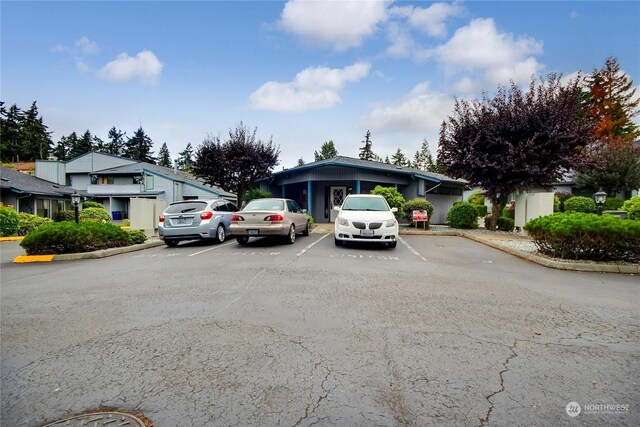 view of front of home featuring uncovered parking