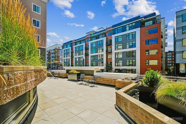 surrounding community featuring a patio area