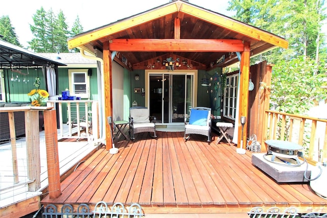 wooden terrace with a gazebo