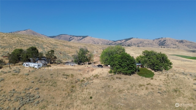 view of mountain feature with a rural view