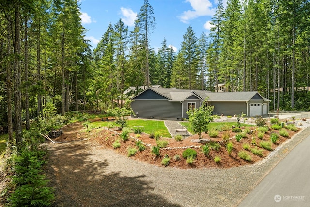 view of front of home featuring driveway and an attached garage