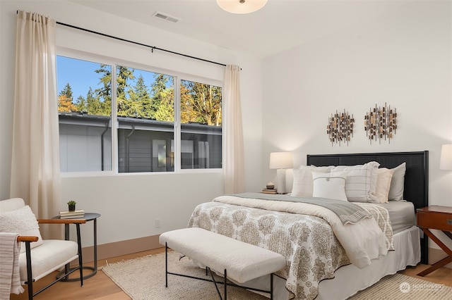 bedroom featuring hardwood / wood-style floors