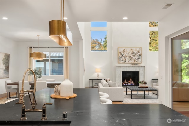 interior space featuring a wealth of natural light and sink