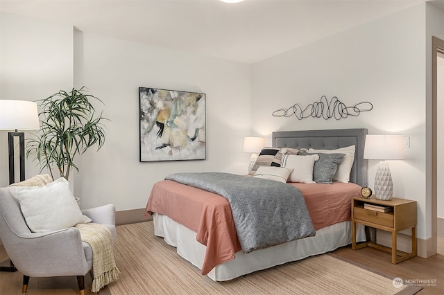 bedroom with light hardwood / wood-style flooring